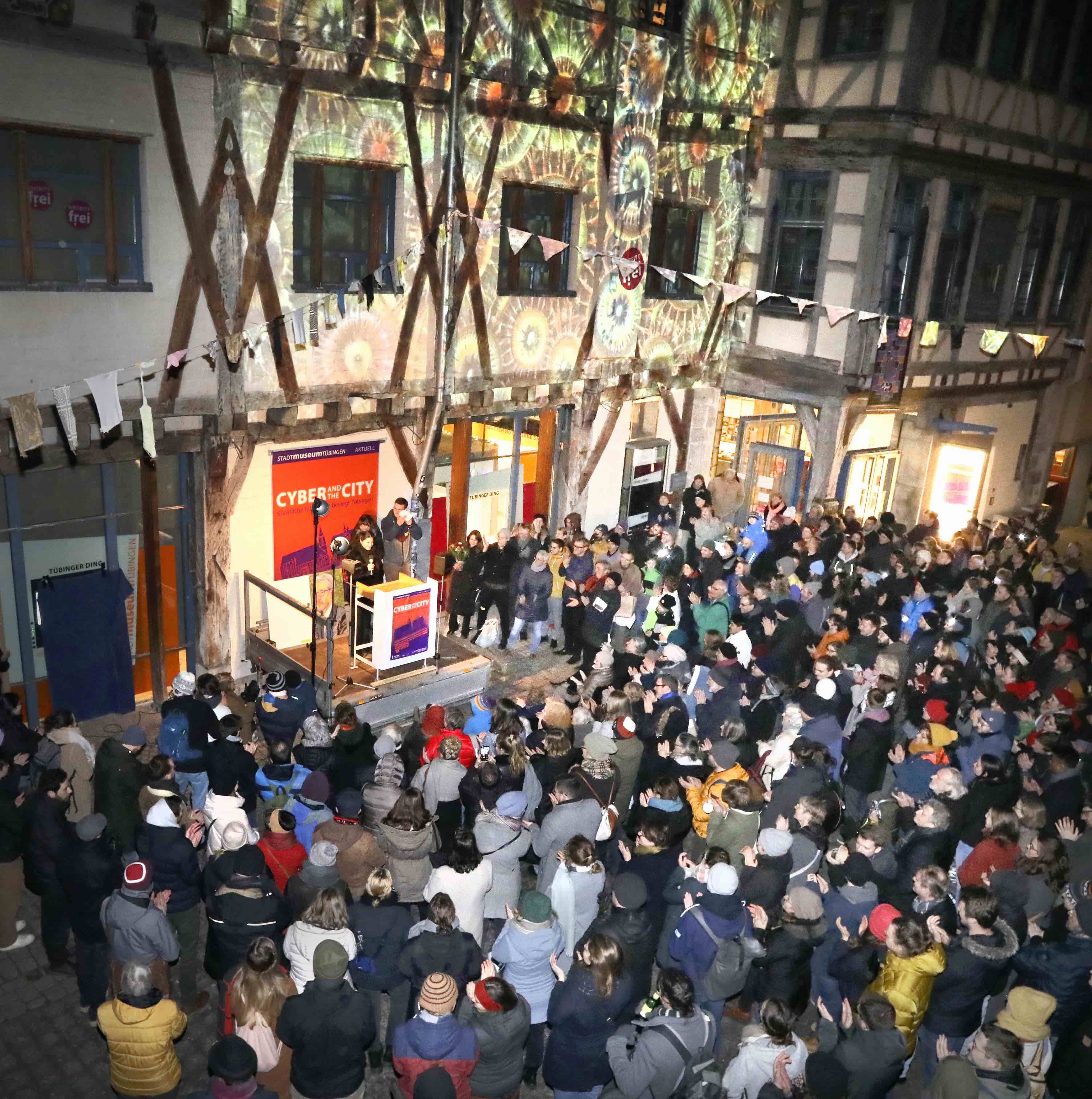 Visitors gathered outside Tübingen's city museum for the exhibition opening