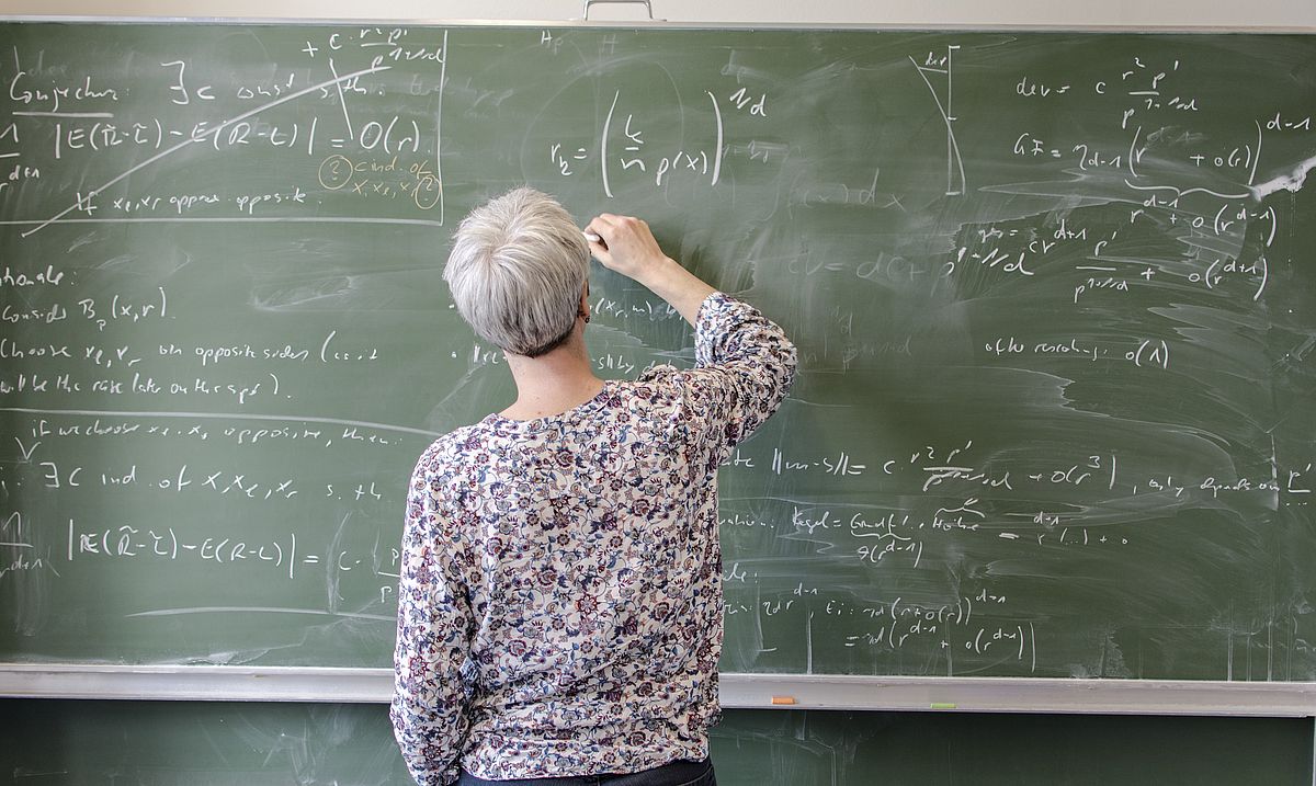 Writing mathematics on a classroom blackboard